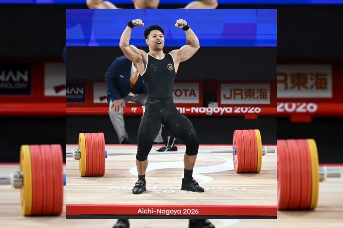 Rahmat Erwin Abdullah saat bertanding angkat besi Asian Games 2026