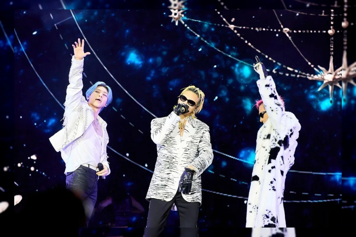 Suasana konser K-pop di stadion dengan lampu panggung